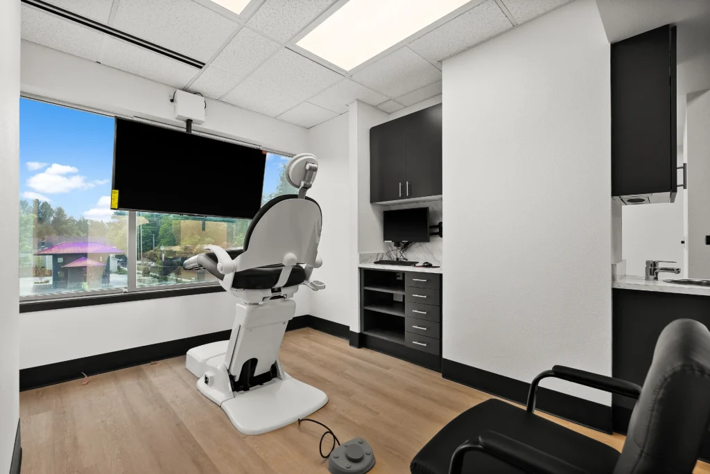 Comfortable dental chair in private treatment room at Smile Now Tacoma Dentures and Implants | Dental implant provider in Tacoma, WA