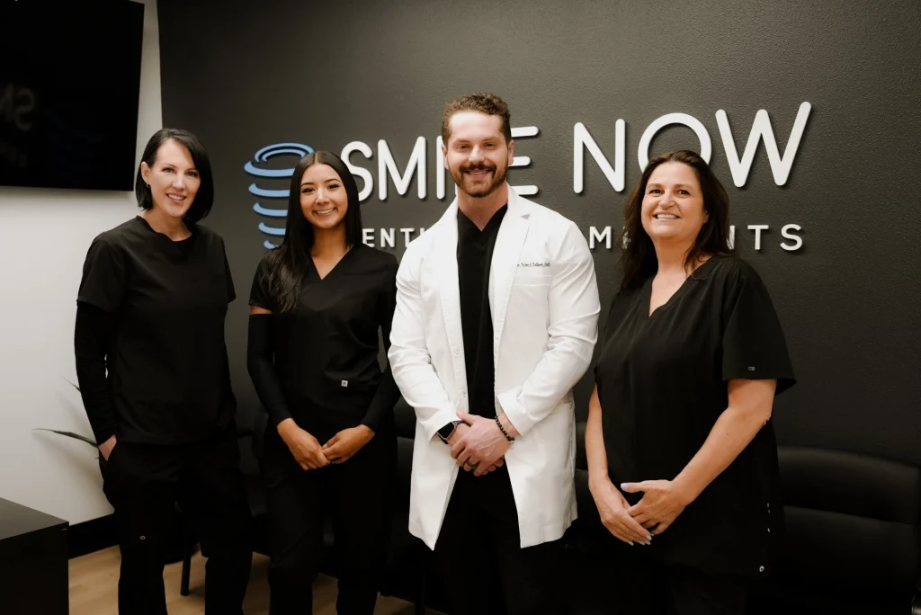 Friendly dental implant team at Smile Now Tacoma Dentures and Implants in Milton, WA